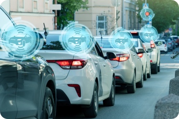 a bunch of cars on a road showcasing connectivity though IoT